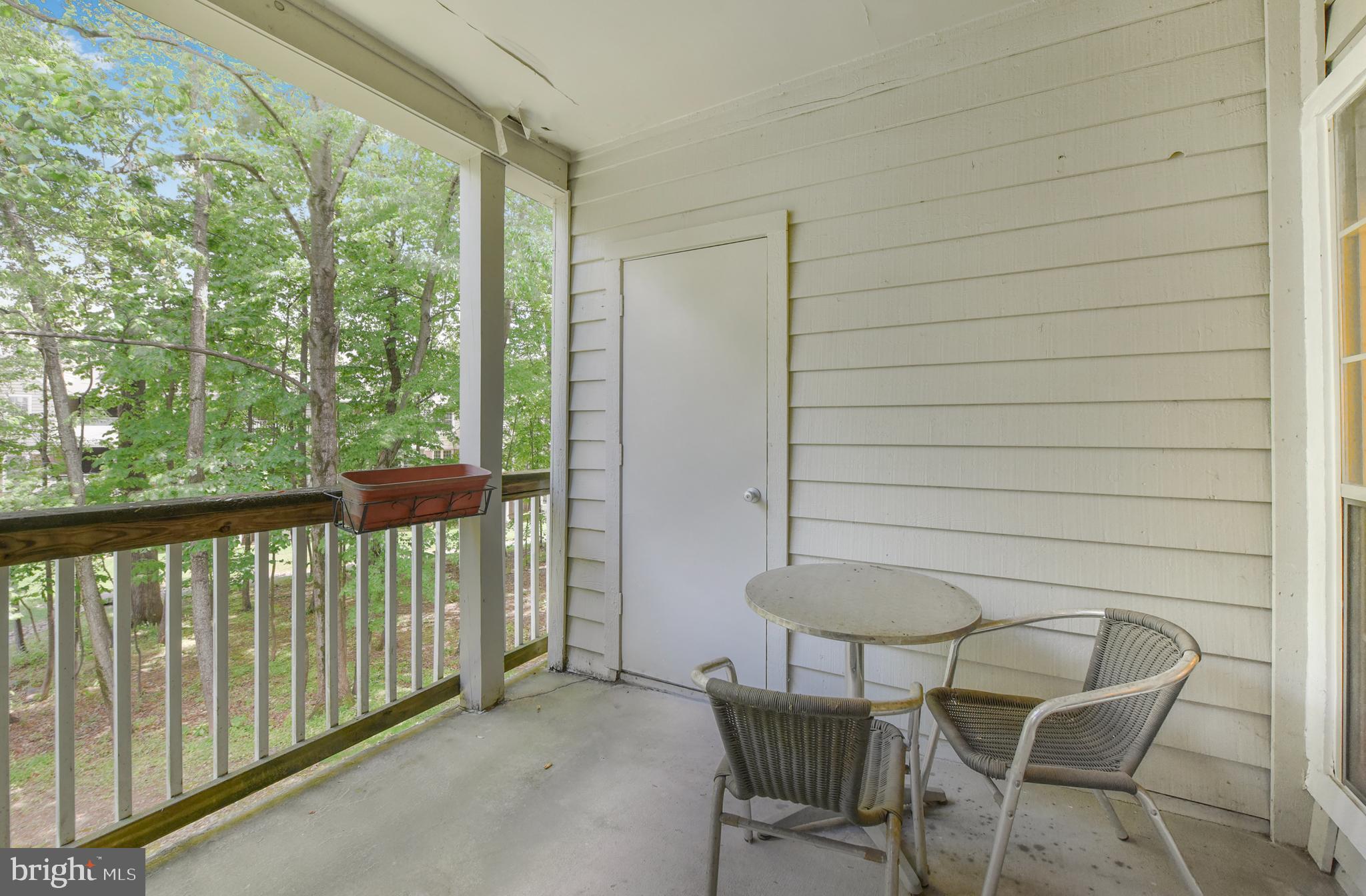 3909 Penderview Drive, Unit 1923 Fairfax, VA 22033 - Photo 18 of 19 a view of a balcony with furniture