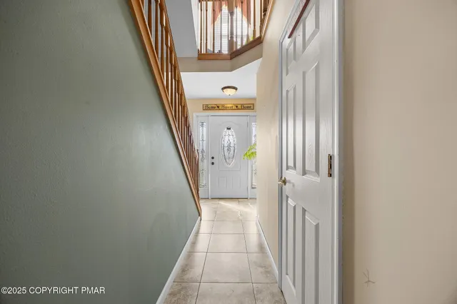 a view of a hallway with entryway