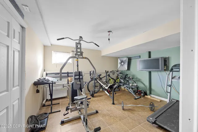 a view of a chairs and table in patio