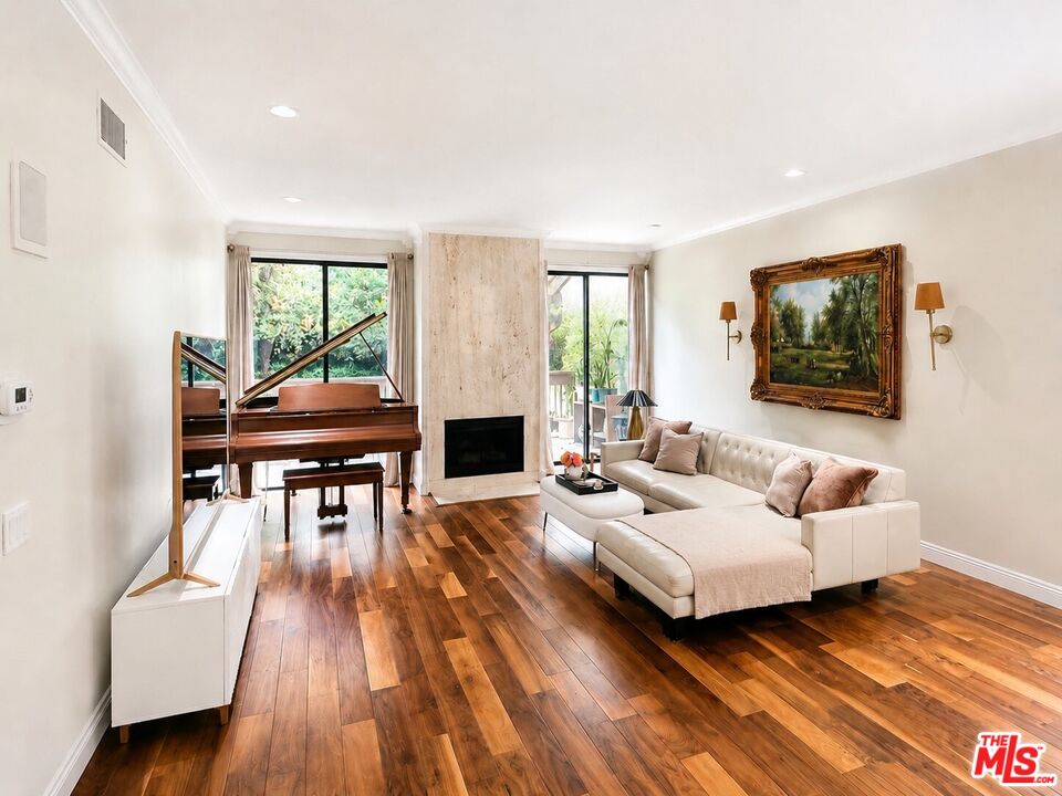 1114 Las Riendas Way Pasadena, CA 91107 - Photo 8 of 20 a living room with furniture and a wooden floor
