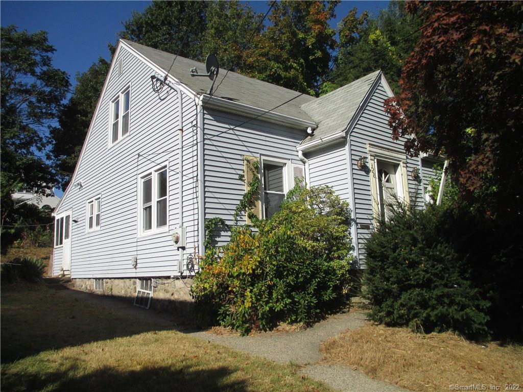 328 Wilson Street Waterbury, CT 06708 - Photo 1 of 1 a view of a house with a yard