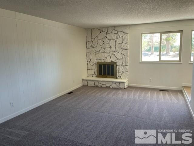 2891 Rice Road Fallon, NV 89406 - Photo 8 of 18 an empty room with a fireplace