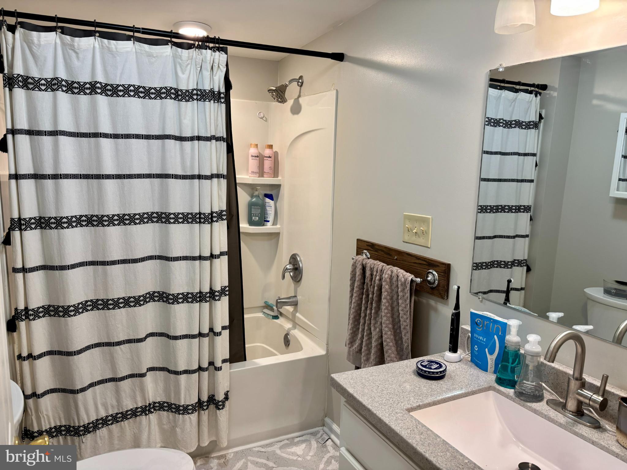 3 Grape Street Reading, PA 19611 - Photo 11 of 19 a bathroom with a sink and a shower
