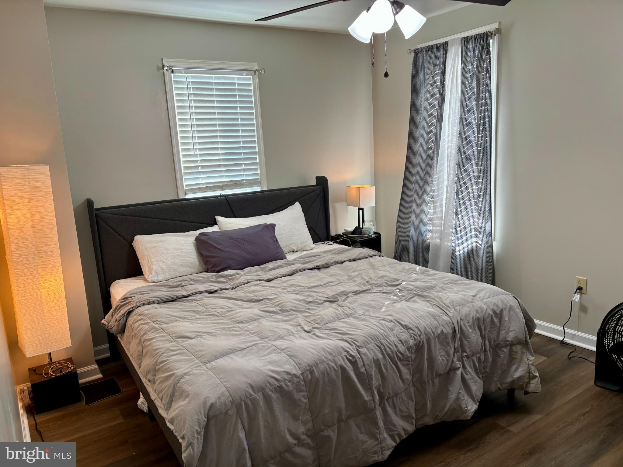 3 Grape Street Reading, PA 19611 - Photo 12 of 19 a bedroom with a bed and a chandelier