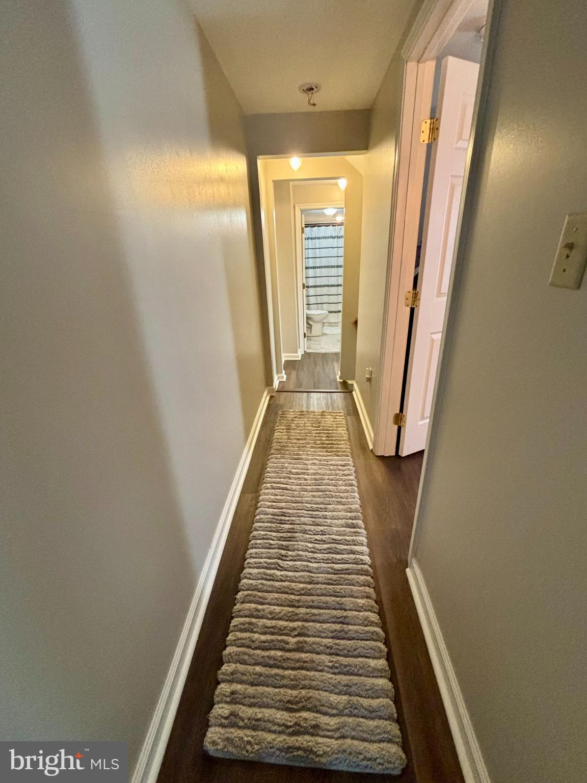3 Grape Street Reading, PA 19611 - Photo 16 of 19 a view of a hallway with wooden floor and staircase