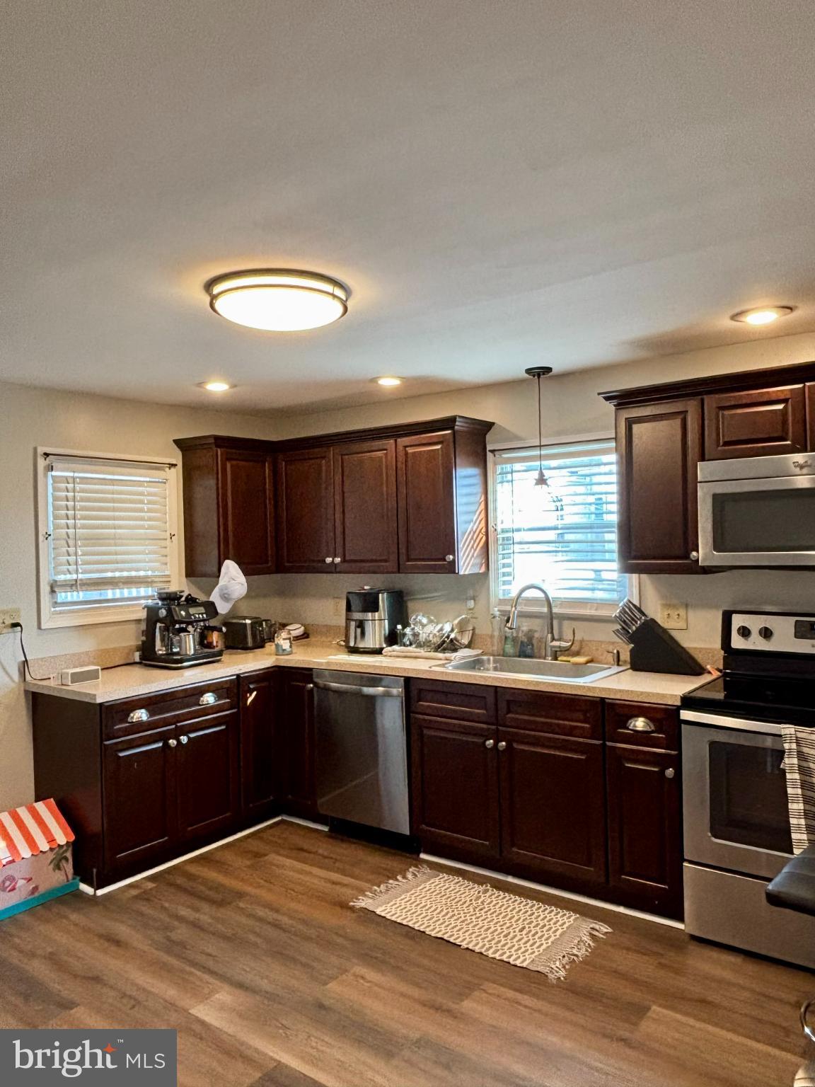 3 Grape Street Reading, PA 19611 - Photo 8 of 19 a kitchen with stainless steel appliances granite countertop a sink and cabinets
