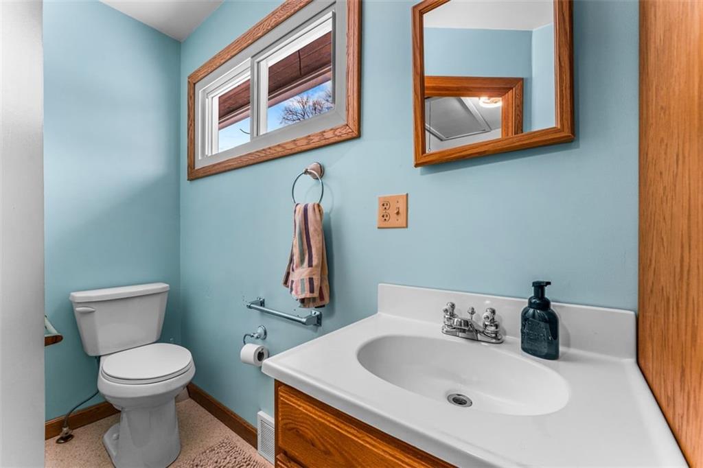 123 Mcelhaney Road Jamestown, PA 16134 - Photo 14 of 30 a bathroom with a toilet sink and mirror