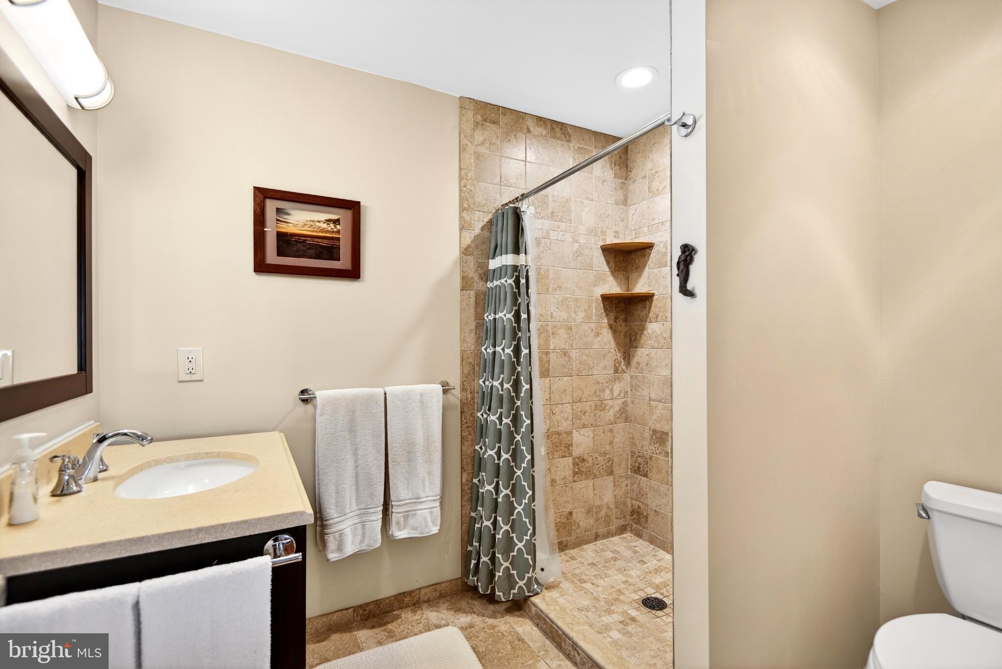 20 Edgewater Drive Tuckerton, NJ 08087 - Photo 39 of 78 Modern bathroom with elegant tile accents.