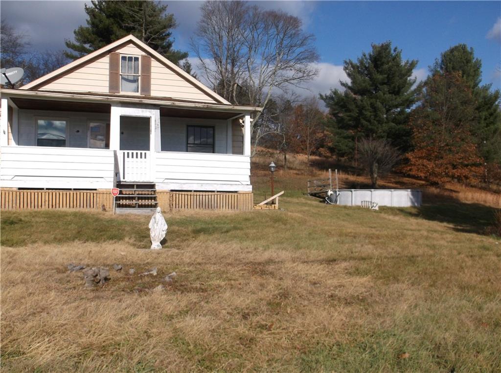 1333 Sugar Hollow Road Apollo, PA 15613 - Photo 2 of 25 a front view of a house with a yard
