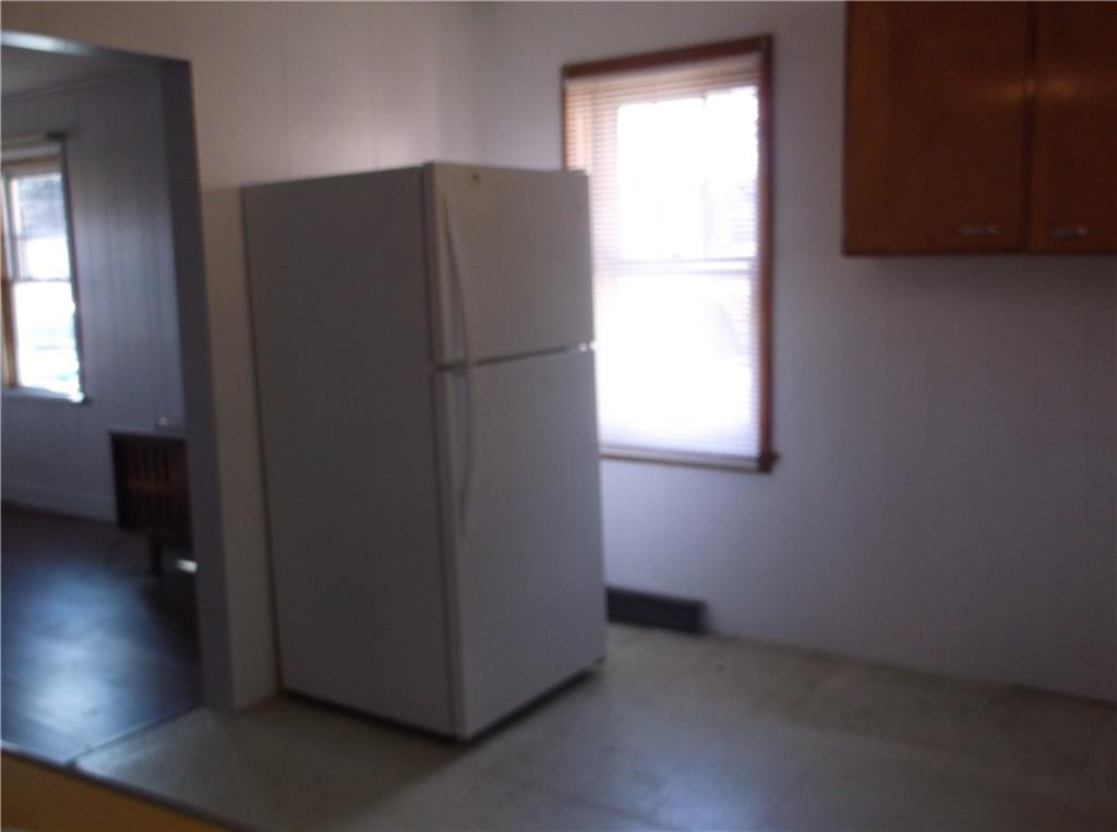 1333 Sugar Hollow Road Apollo, PA 15613 - Photo 17 of 25 an empty room with wooden floor and windows