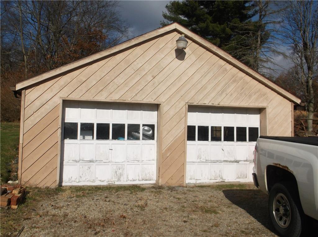 1333 Sugar Hollow Road Apollo, PA 15613 - Photo 6 of 25 a front view of a house with a yard