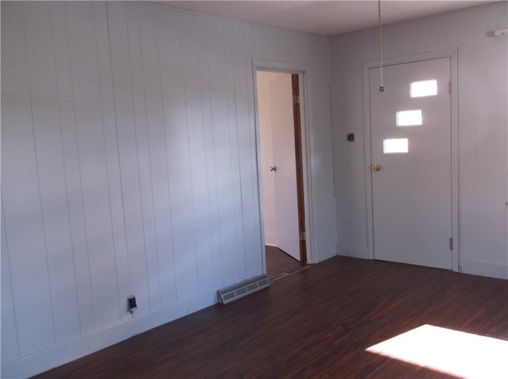 1333 Sugar Hollow Road Apollo, PA 15613 - Photo 8 of 25 a view of an empty room with wooden floor