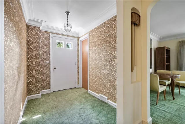 a view of livingroom with hallway and dining room