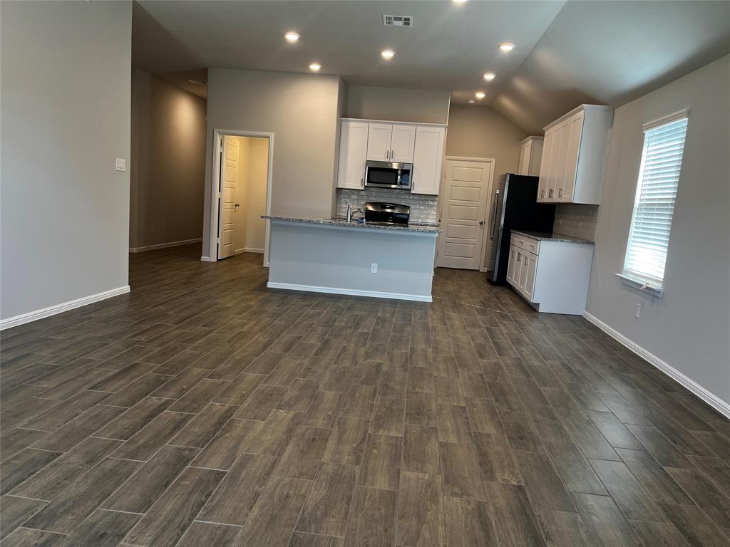 409 Wydown Drive Princeton, TX 75407 - Photo 21 of 29 a view of kitchen view wooden floor and kitchen counter top space