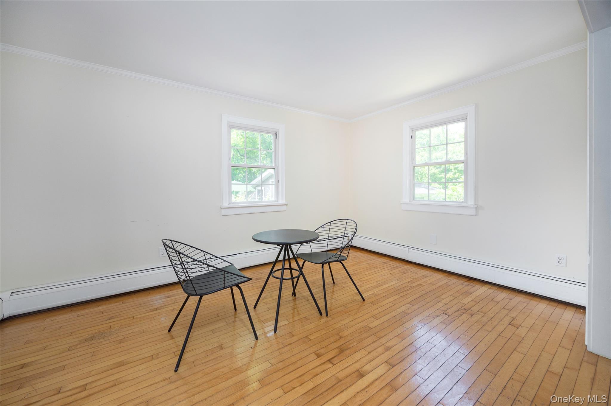 83-85 Old Post Road Staatsburg, NY 12580 - Photo 12 of 36 a view of a work space with wooden floor and a window