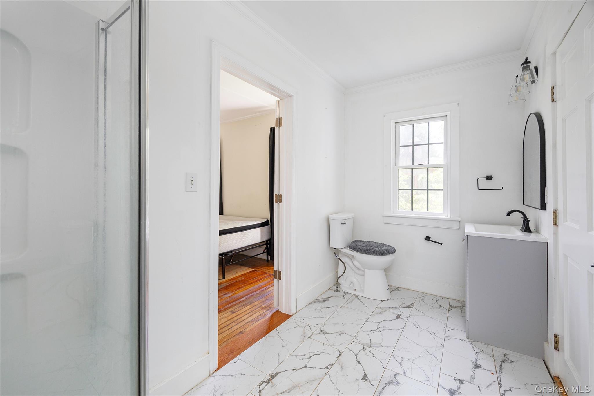 83-85 Old Post Road Staatsburg, NY 12580 - Photo 13 of 36 a bathroom with a sink toilet and shower