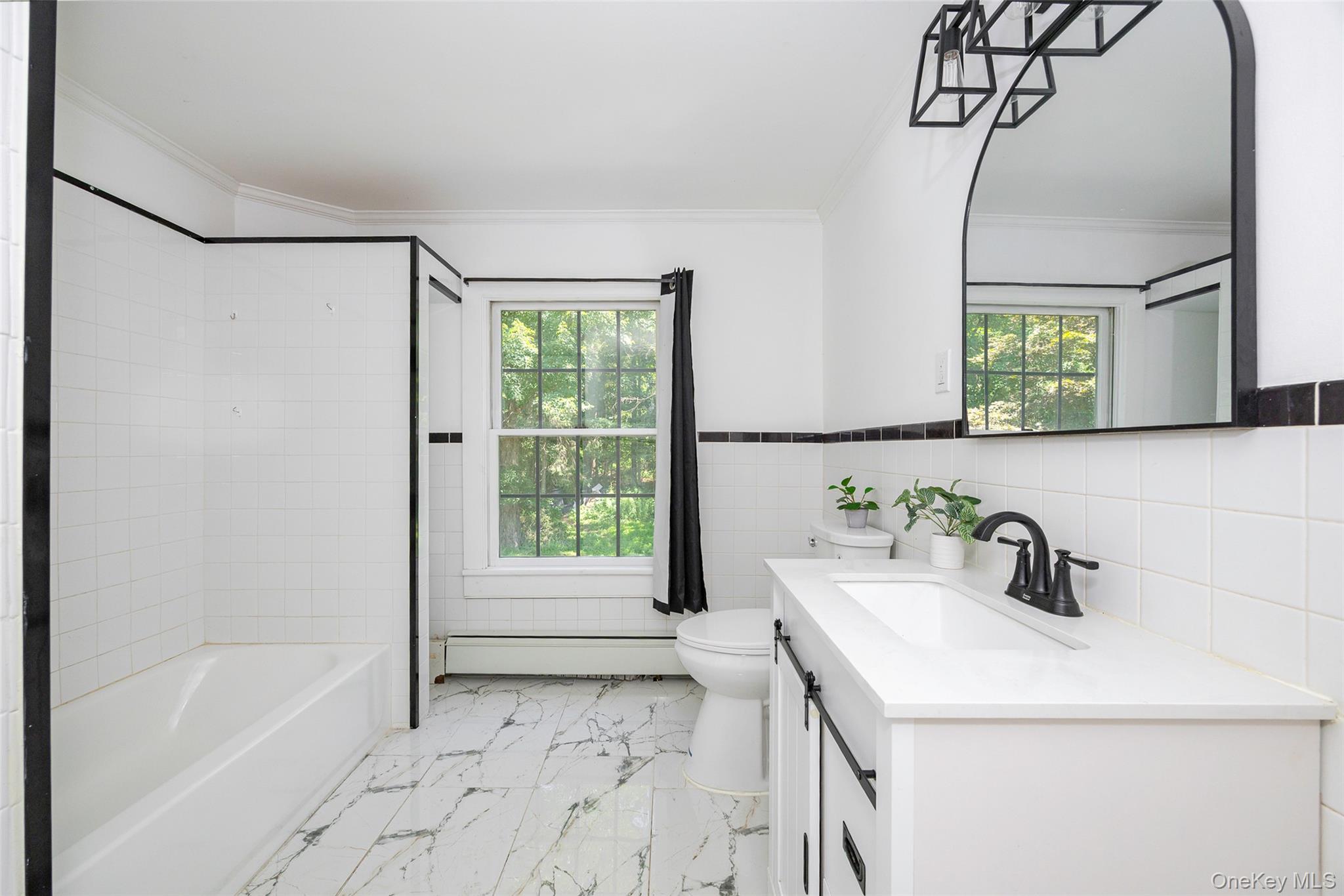 83-85 Old Post Road Staatsburg, NY 12580 - Photo 18 of 36 a bathroom with a sink a bathtub and a shower