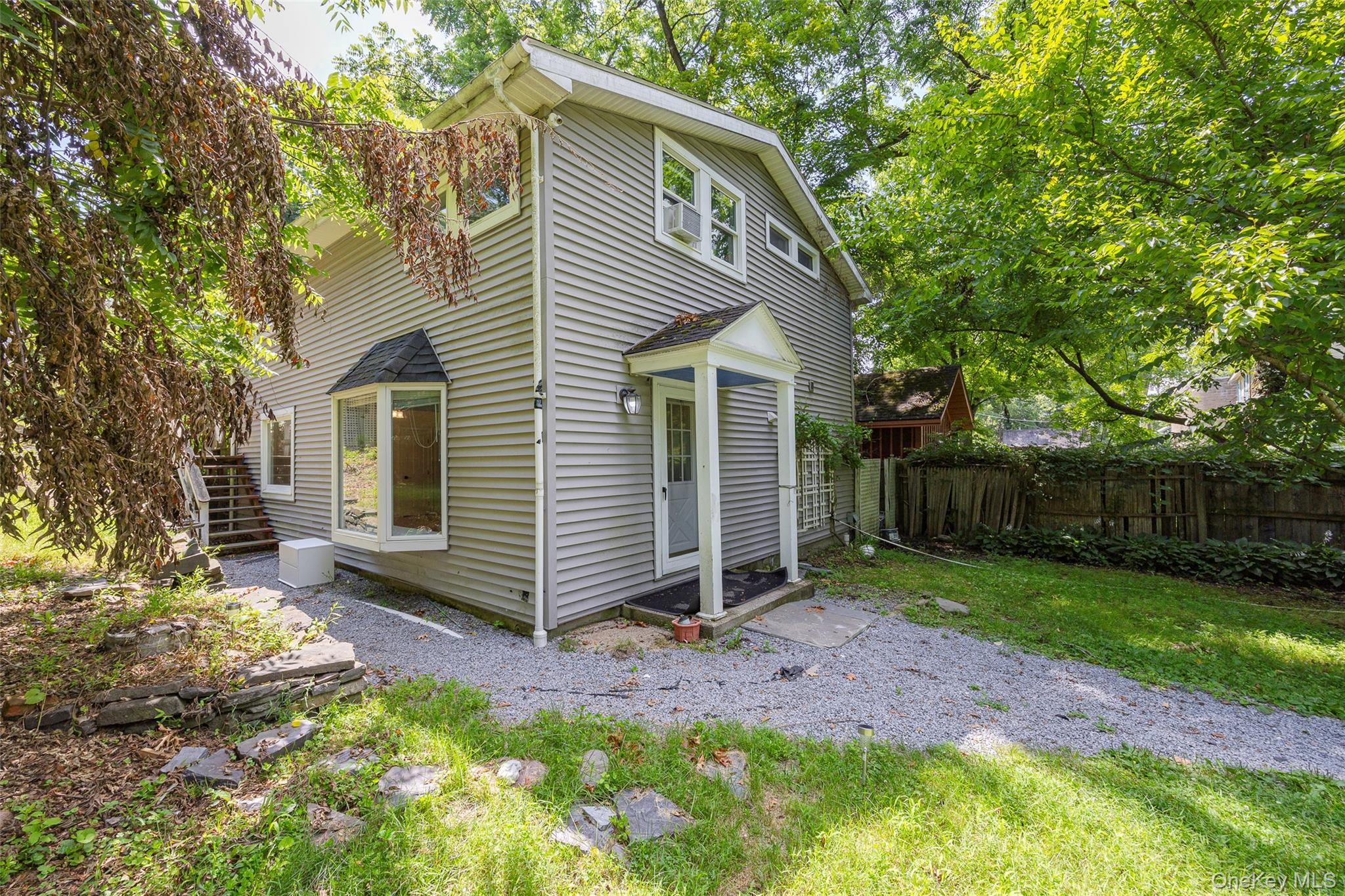 83-85 Old Post Road Staatsburg, NY 12580 - Photo 22 of 36 a view of a small house with a yard