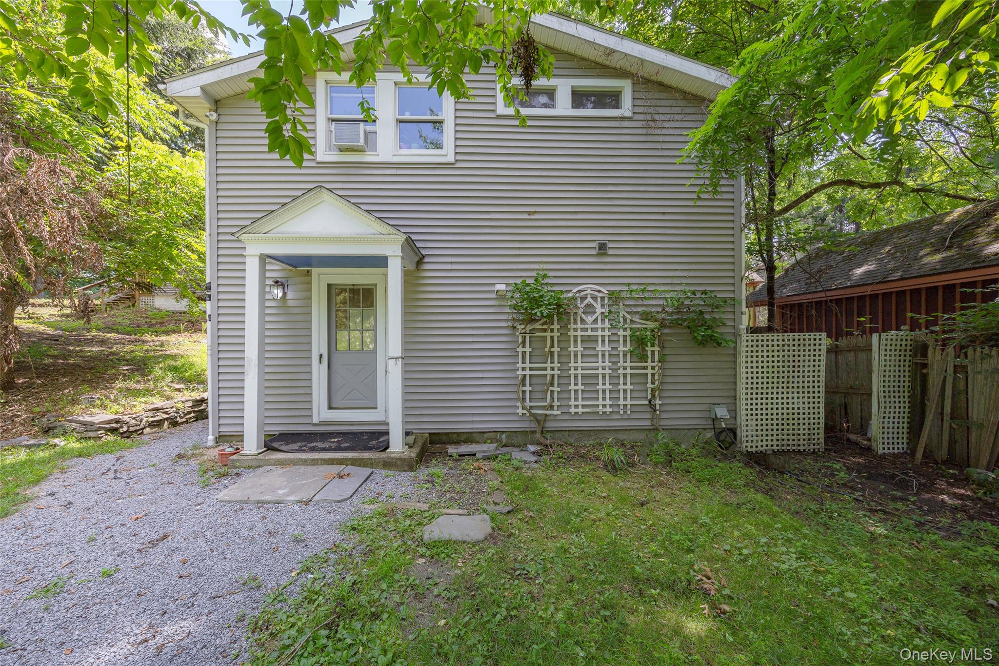 83-85 Old Post Road Staatsburg, NY 12580 - Photo 23 of 36 a view of a house with a yard and garage