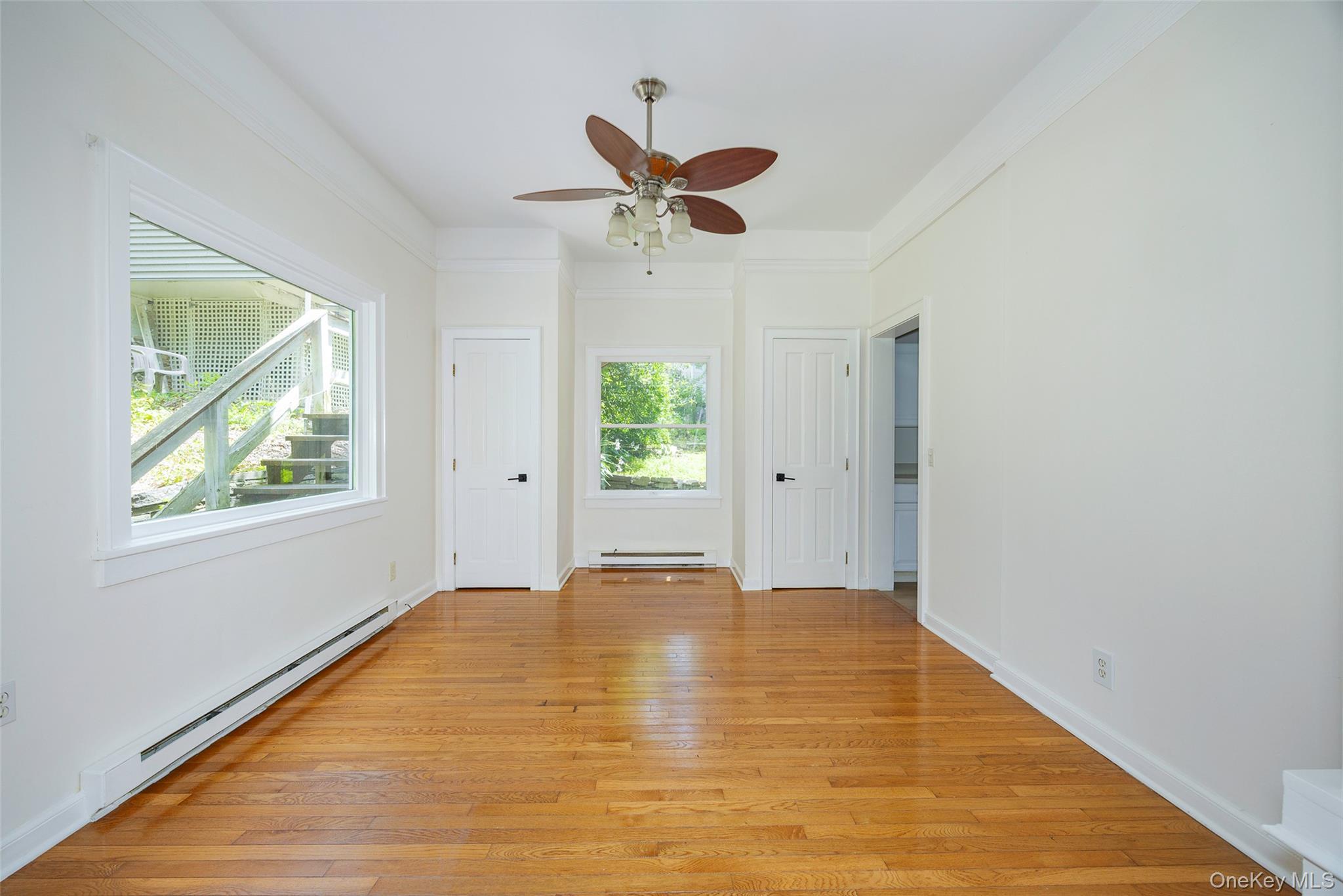 83-85 Old Post Road Staatsburg, NY 12580 - Photo 26 of 36 a view of empty room with window and ceiling fan