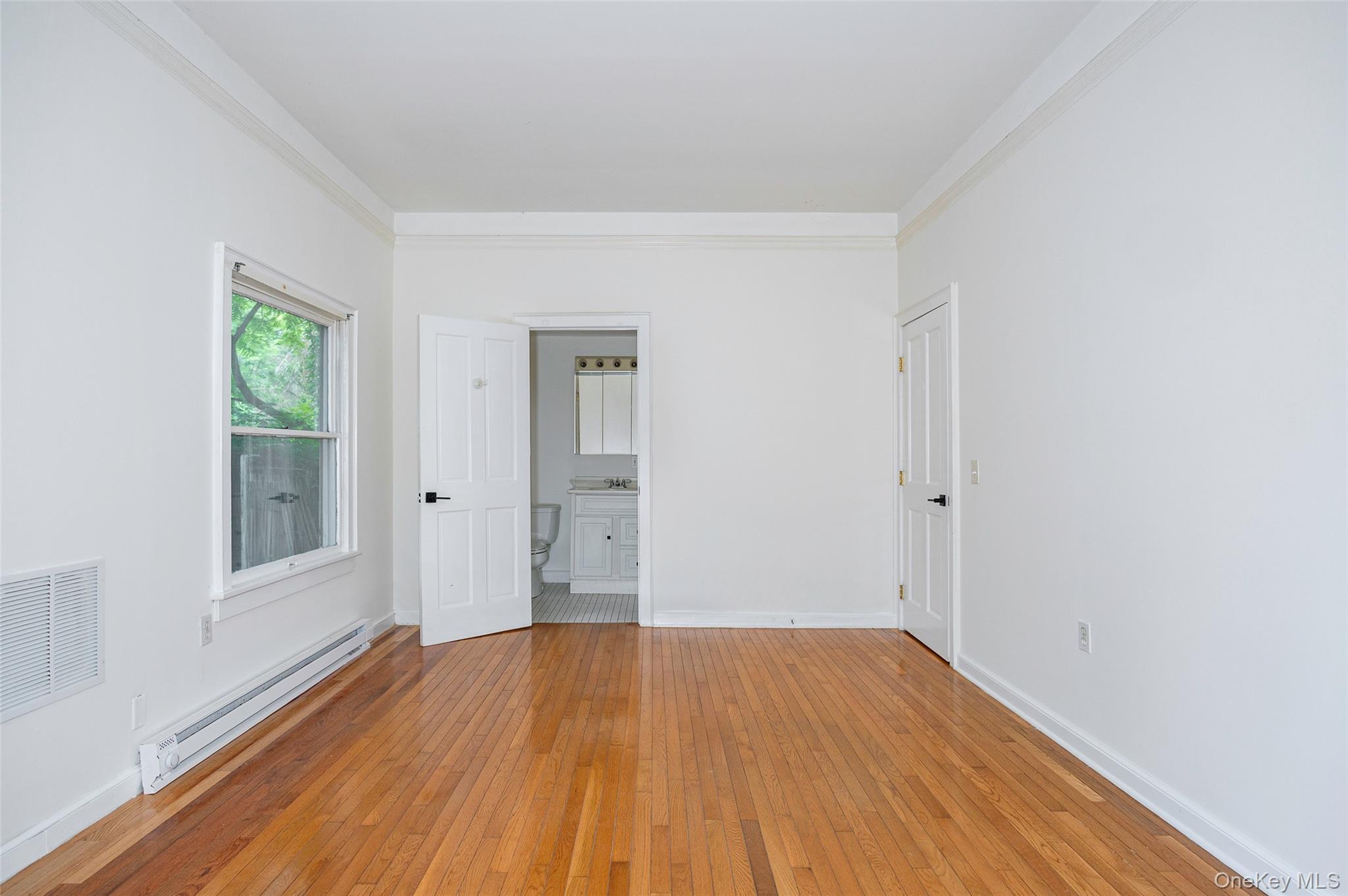 83-85 Old Post Road Staatsburg, NY 12580 - Photo 31 of 36 a view of empty room with wooden floor and fan