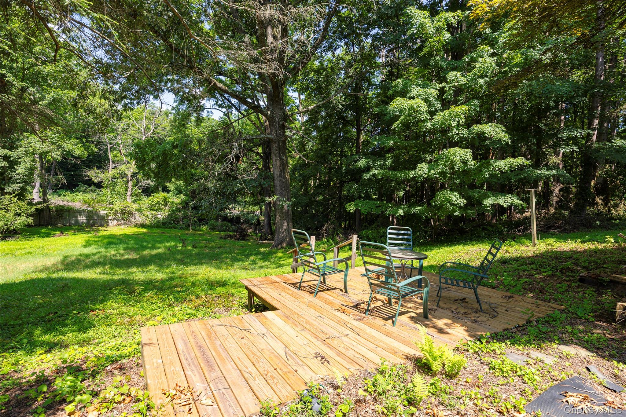83-85 Old Post Road Staatsburg, NY 12580 - Photo 4 of 36 a view of backyard with a table and chairs