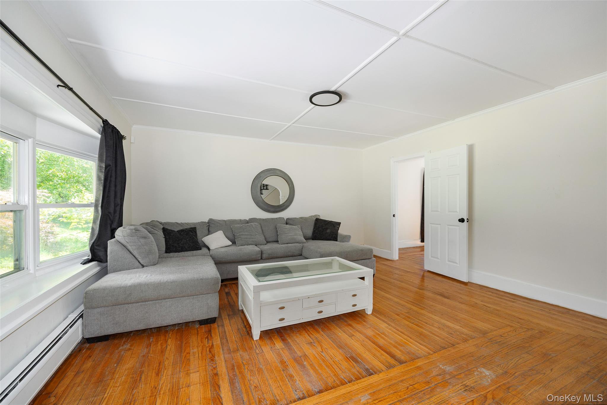 83-85 Old Post Road Staatsburg, NY 12580 - Photo 7 of 36 a living room with furniture and a large window