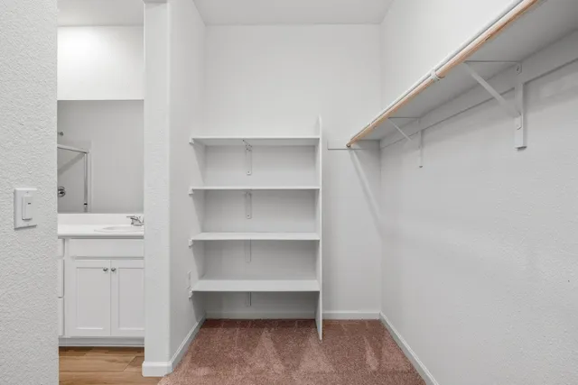 a view of room with cabinets