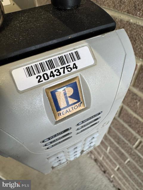 19375 Cypress Ridge Terrace, Unit 1111 Leesburg, VA 20176 - Photo 36 of 52 Lock box serial number