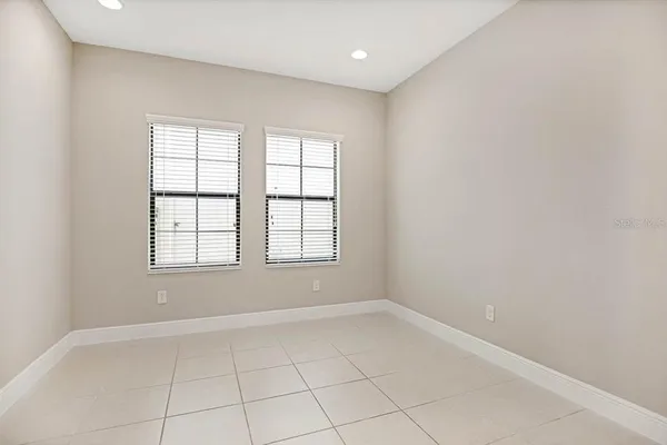 en empty room with entrance and door
