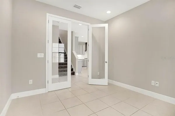 a view of a kitchen with a window