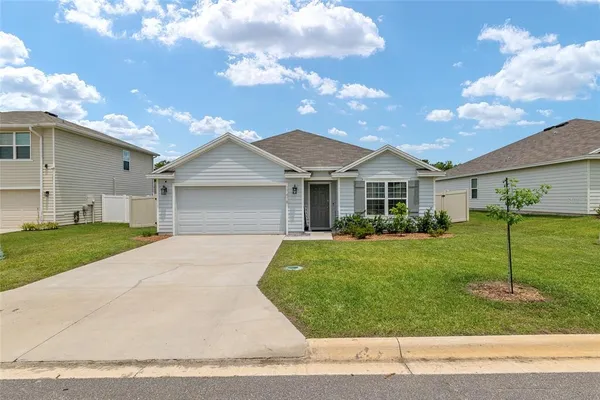 front view of a house and a yard