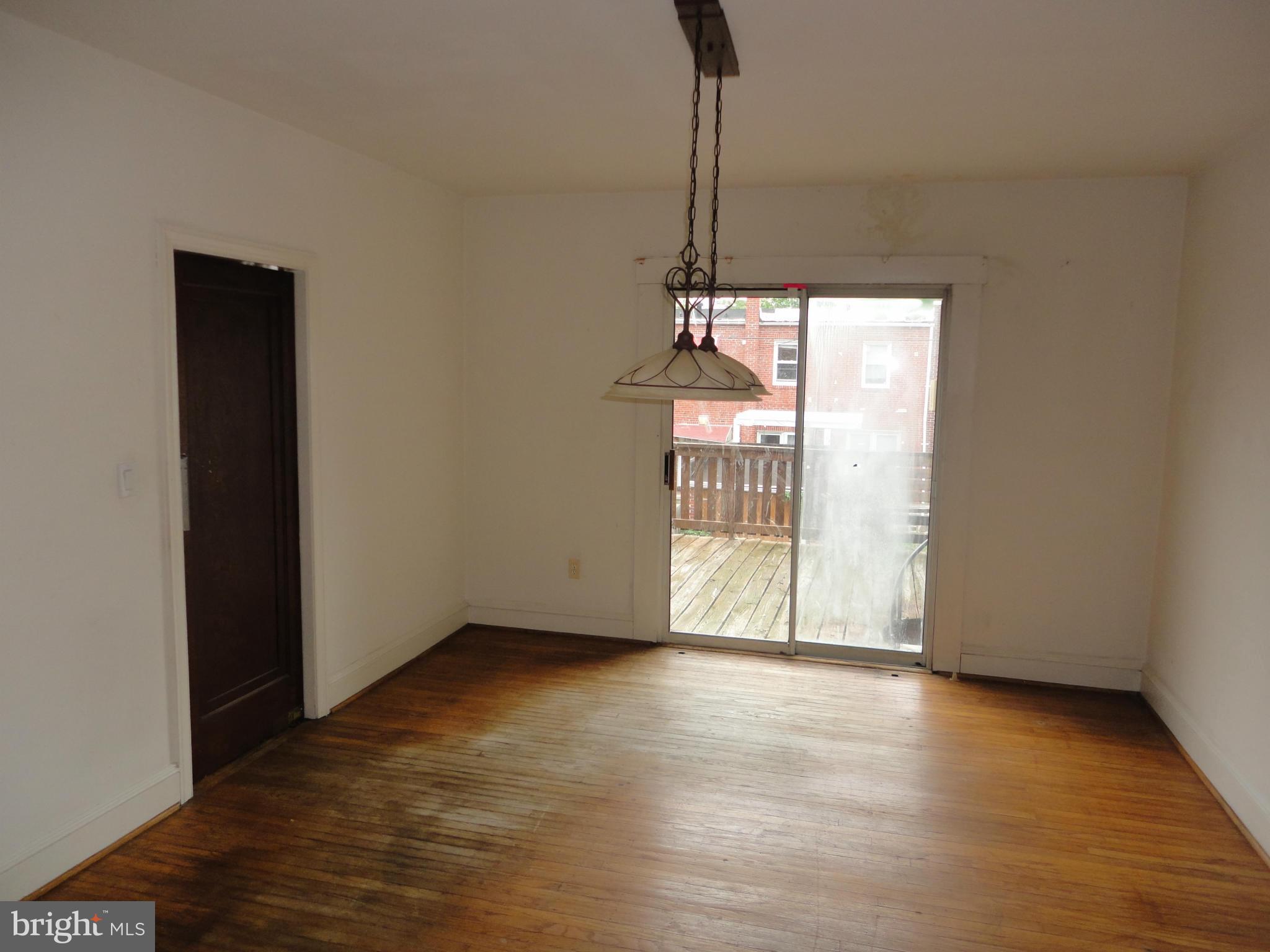 3701 Kimble Road Baltimore, MD 21218 - Photo 7 of 20 Dining Room leads to rear deck