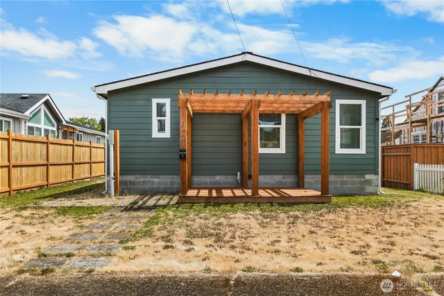 a front view of a house with garden