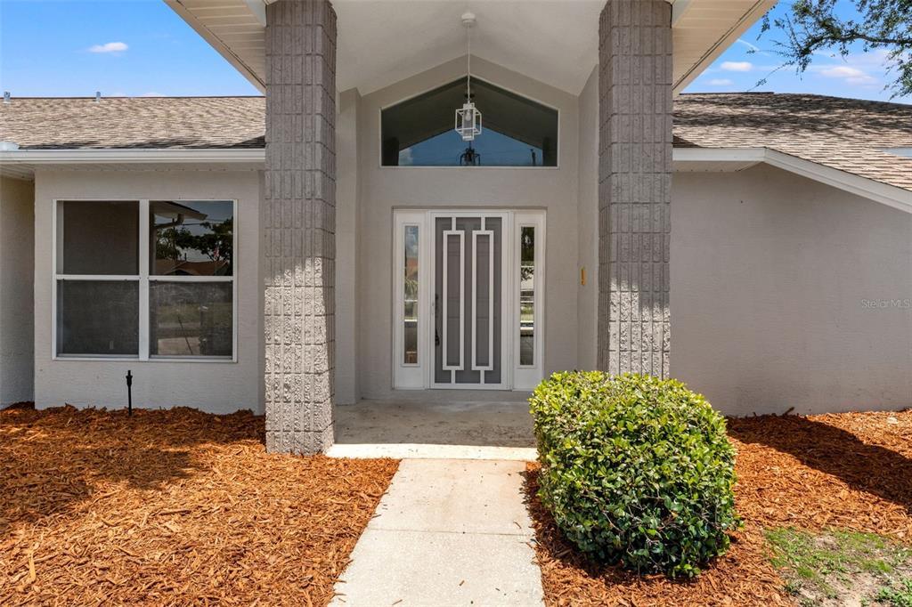 11015 Captain Drive Spring Hill, FL 34608 - Photo 2 of 46 Front entrance