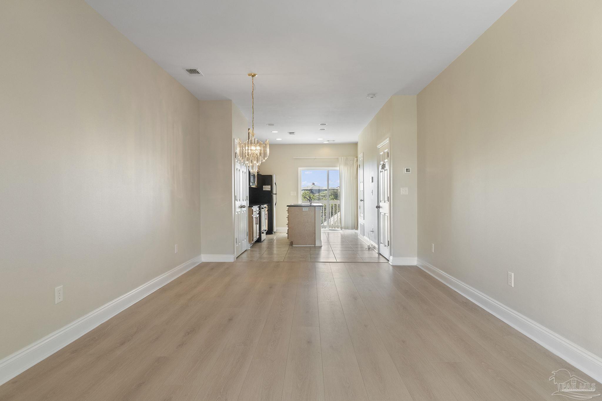 16300 Perdido Key Drive, Unit 20 Perdido Key, FL 32507 - Photo 14 of 47 a view of a kitchen with a sink and a refrigerator