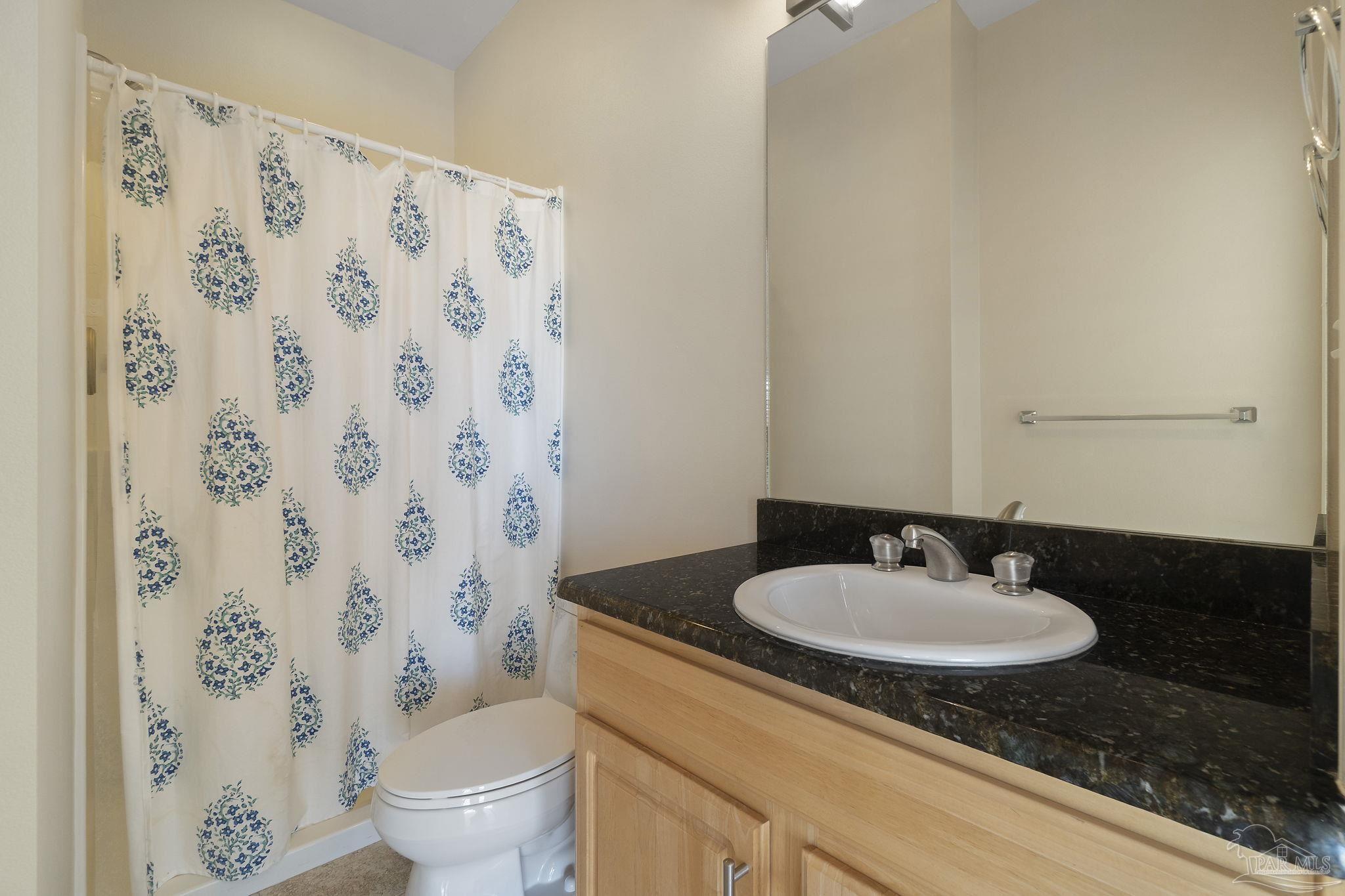 16300 Perdido Key Drive, Unit 20 Perdido Key, FL 32507 - Photo 26 of 47 a bathroom with a sink and a mirror