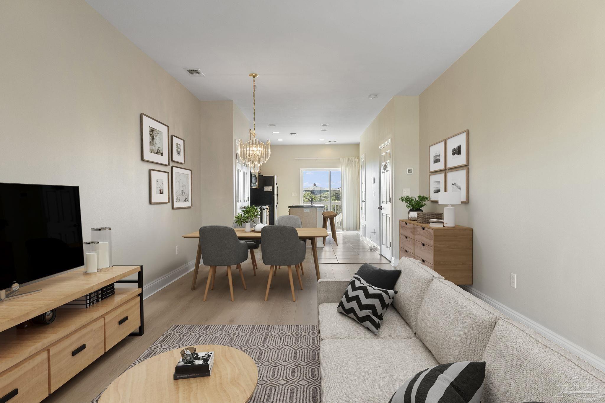 16300 Perdido Key Drive, Unit 20 Perdido Key, FL 32507 - Photo 44 of 47 a living room with furniture and a flat screen tv