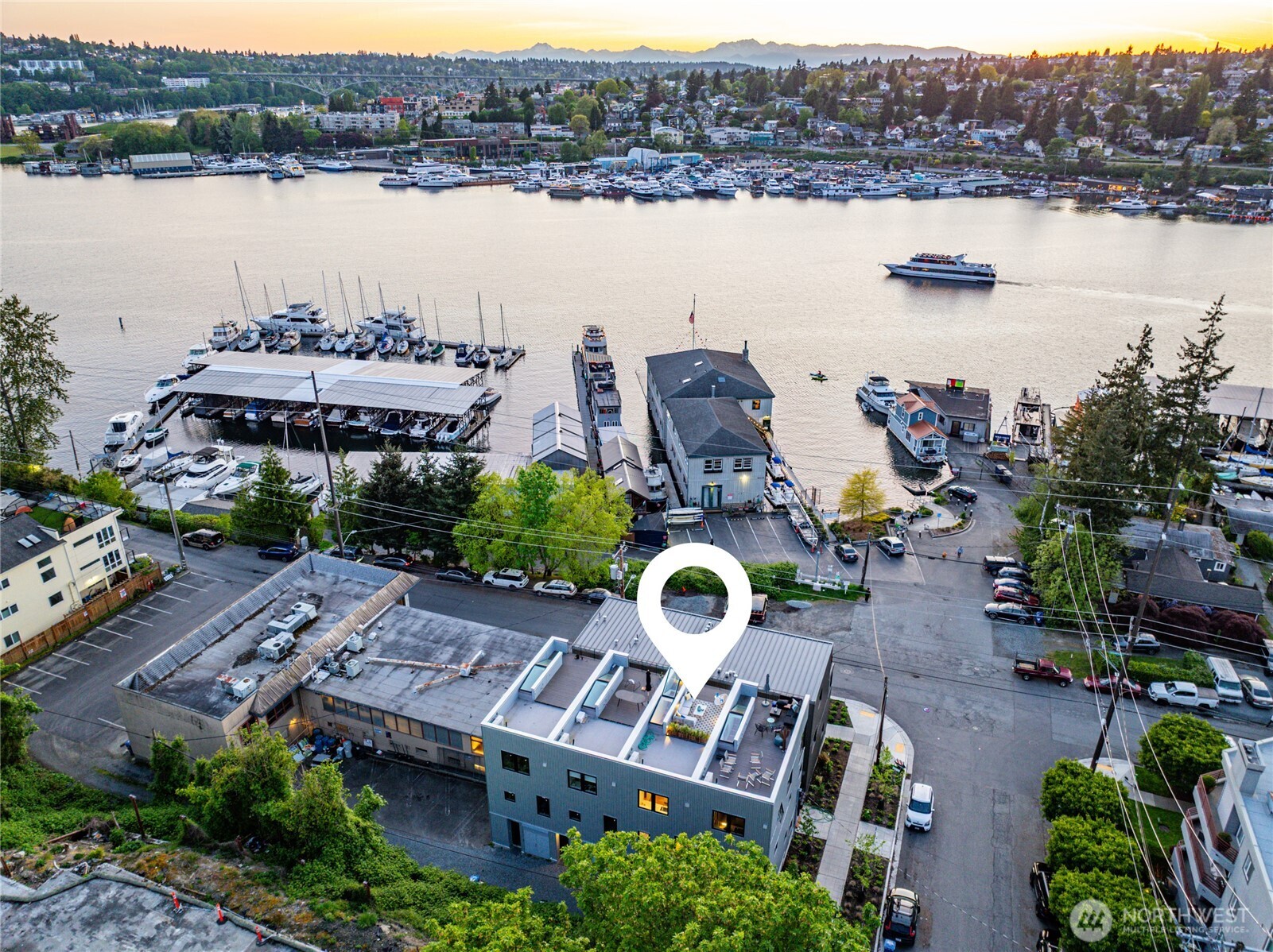 115 East Allison Street Seattle, WA 98102 - Photo 18 of 23 an aerial view of a house with outdoor space and lake view