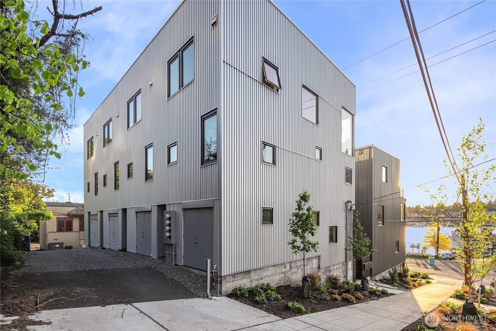 115 East Allison Street Seattle, WA 98102 - Photo 22 of 23 a view of a large building with a tree
