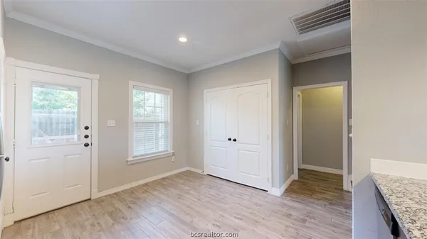 a view of livingroom with hardwood floor and hallway