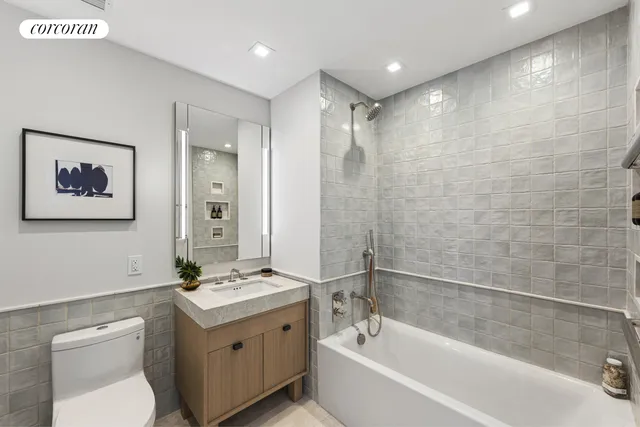 a bedroom with a large bed and a large window