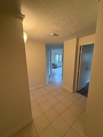 a view of balcony with furniture