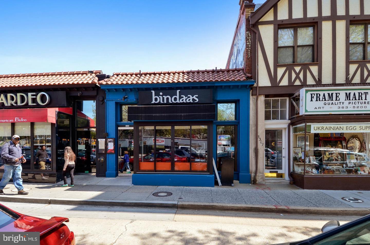 2712 Ordway Street Northwest, Unit 5 Washington, DC 20008 - Photo 23 of 26 a view of shops on a street