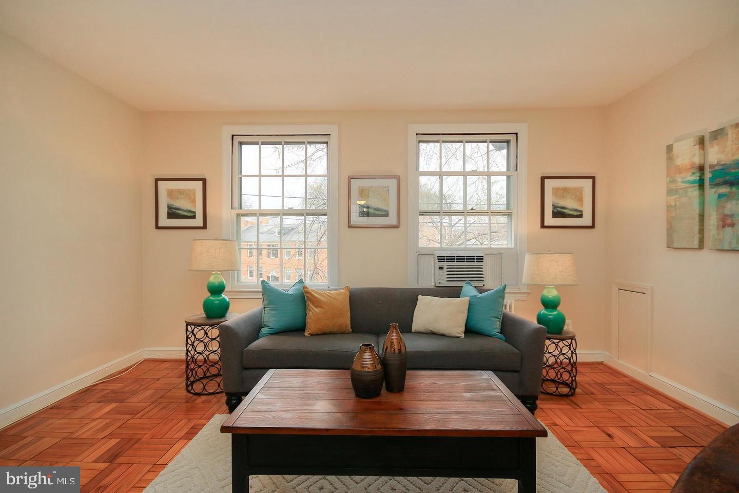 2712 Ordway Street Northwest, Unit 5 Washington, DC 20008 - Photo 3 of 26 a living room with furniture and wooden floor