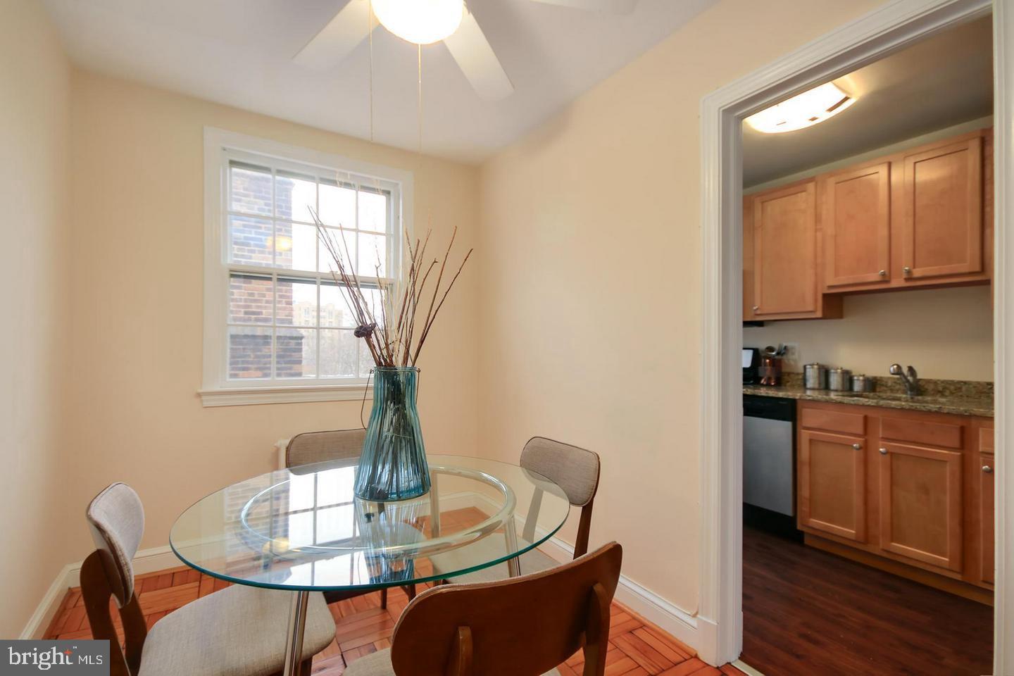 2712 Ordway Street Northwest, Unit 5 Washington, DC 20008 - Photo 8 of 26 a dining room with furniture and window