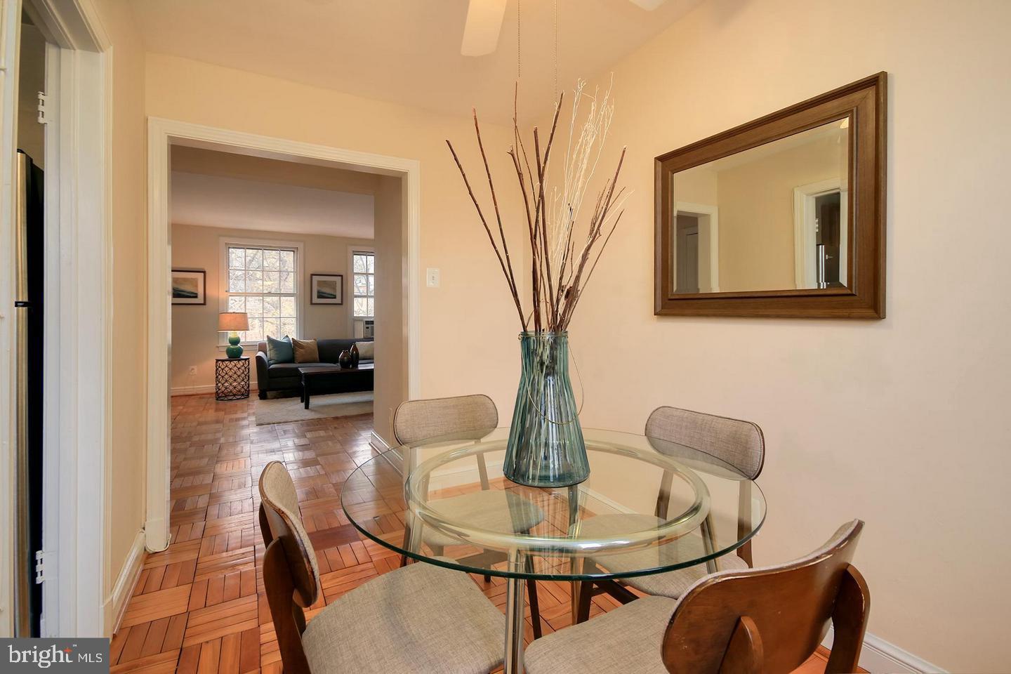 2712 Ordway Street Northwest, Unit 5 Washington, DC 20008 - Photo 9 of 26 a living room with furniture and a table