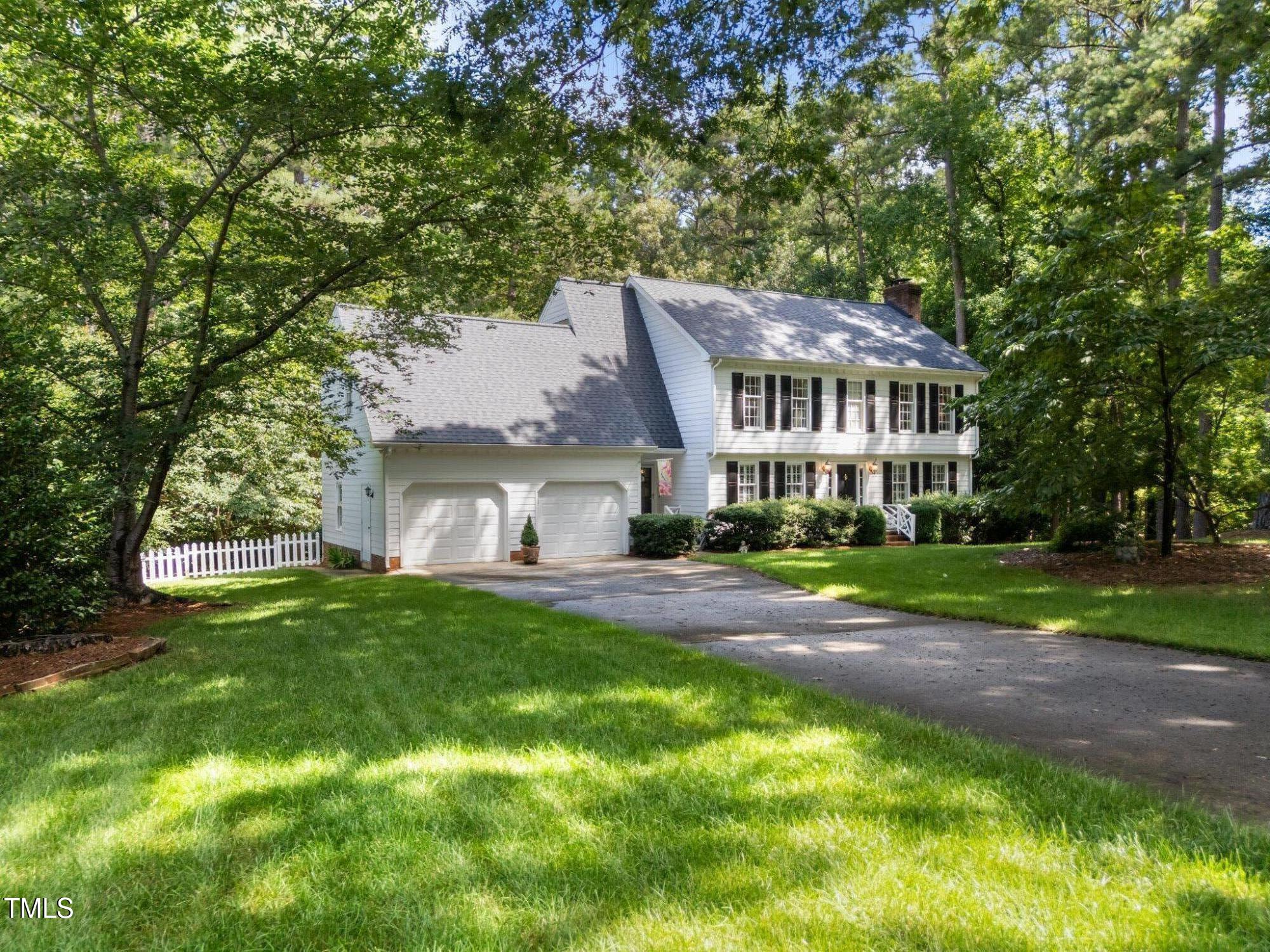 8909 Wellsley Way Raleigh, NC 27613 - Photo 1 of 47 50-web-or-mls-DJI_20250617105645_0987_D
