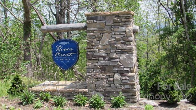 0 High Peak Ridge, Unit 7 Green Mountain, NC 28740 - Photo 17 of 27 a sign on the side of a road