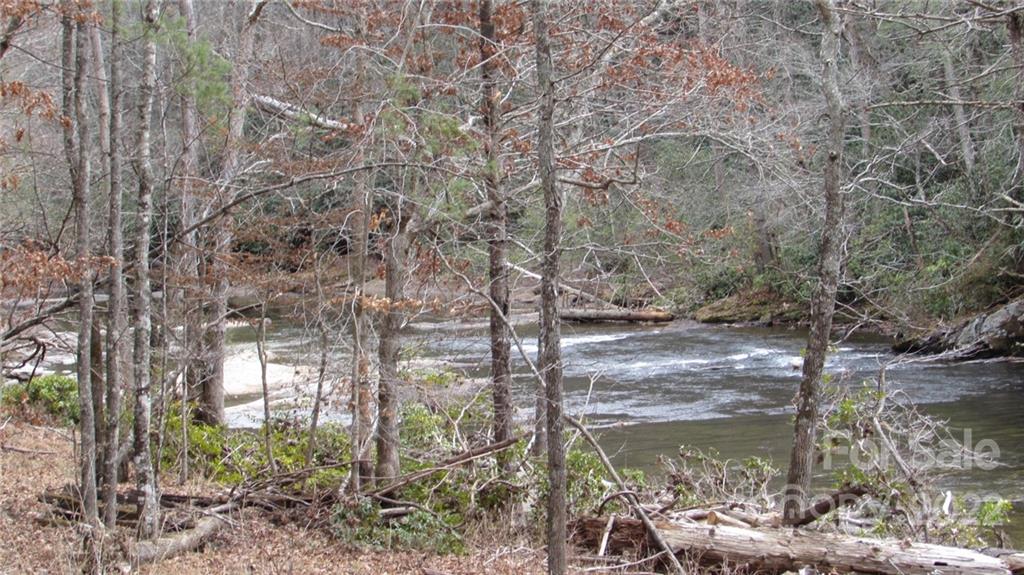 0 High Peak Ridge, Unit 7 Green Mountain, NC 28740 - Photo 22 of 27 a backyard of a house with lots of green space